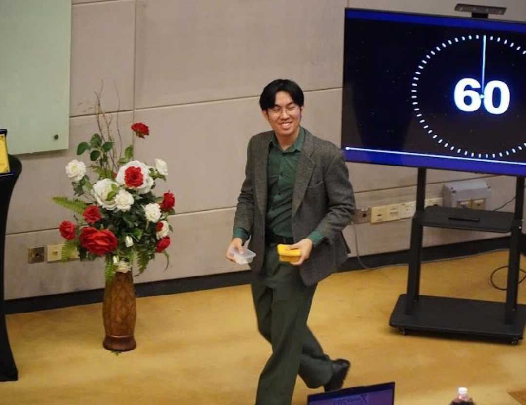 Person presenting at a business competition event